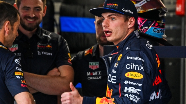 Red Bull Racing's Dutch driver Max Verstappen looks on as he stands in his garage ahead of the Miami Grand Prix in Miami Gardens, Florida on May 5, 2022. (Photo by CHANDAN KHANNA / AFP)