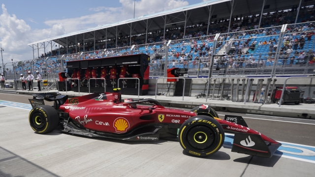 Ferrari driver Carlos Sainz of Spain pulls out of the pits during the first practice session for the Formula One Miami Grand Prix auto race at the Miami International Autodrome, Friday, May 6, 2022, in Miami Gardens, Fla. (AP Photo/Darron Cummings)
