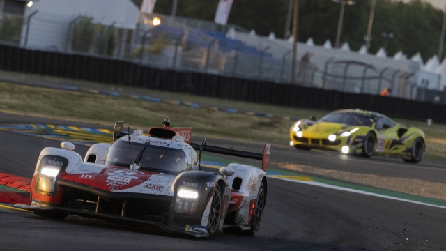 Toyota Gazoo Racing car a Toyota GR010 Hybrid with Sebastien Buemi of Switzerland, Brendon Hartley of New Zealand and Ryo Hirakawa of Japan takes a curve during the 24-hour Le Mans endurance race in Le Mans, western France, Sunday June 12, 2022. (AP Photo/Jeremias Gonzalez)
