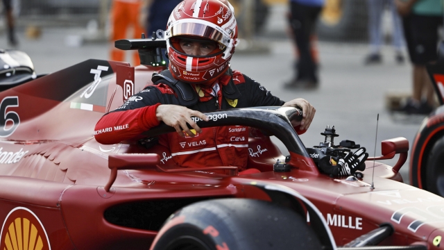 epa10008078 Monaco's Formula One driver Charles Leclerc of Scuderia Ferrari gets out of his car after taking pole position in qualifying of the Formula One Grand Prix of Azerbaijan at the Baku City Circuit in Baku, Azerbaijan, 11 June 2022. The Formula One Grand Prix of Azerbaijan will take place on 12 June 2022.  EPA/Hamad Mohammed / POOL