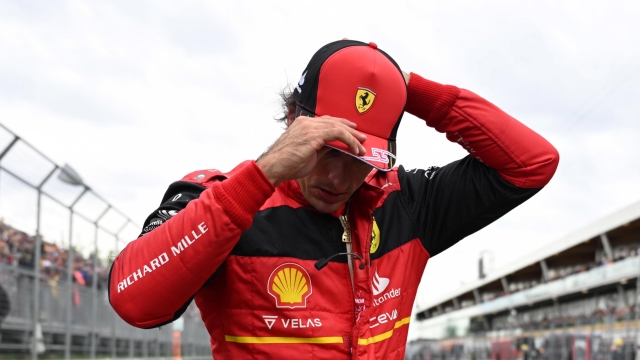 epa10021280 Spanish Formula One driver Carlos Sainz of Scuderia Ferrari puts a cap on after the qualifying of the Formula One Grand Prix of Canada at the Circuit Gilles-Villeneuve in Montreal, Canada, 18 June 2022. The Formula One Grand Prix of Canada will take place on 19 June 2022.  EPA/Jim WATSON / POOL