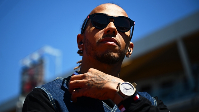 MONTREAL, QUEBEC - JUNE 19: Lewis Hamilton of Great Britain and Mercedes looks on from the drivers parade ahead of the F1 Grand Prix of Canada at Circuit Gilles Villeneuve on June 19, 2022 in Montreal, Quebec.   Clive Mason/Getty Images/AFP == FOR NEWSPAPERS, INTERNET, TELCOS & TELEVISION USE ONLY ==