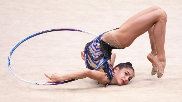 Italy's Sofia Raffaeli competes in the individual all-around final during the Rhythmic Gymnastics World Championships at the West Japan General Exhibition Centre in Kitakyushu, Fukuoka prefecture on October 30, 2021. (Photo by Charly TRIBALLEAU / AFP)