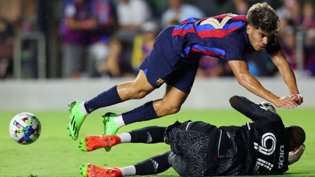 FORT LAUDERDALE, FLORIDA - JULY 19: Goalkeeper Clement Diop #94 of Inter Miami CF makes a save against Abde Ezzalzouli #27 of FC Barcelona during the second half of a preseason friendly at DRV PNK Stadium on July 19, 2022 in Fort Lauderdale, Florida.   Michael Reaves/Getty Images/AFP
== FOR NEWSPAPERS, INTERNET, TELCOS & TELEVISION USE ONLY ==