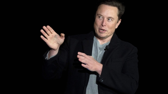 (FILES) In this file photo taken on February 10, 2022, Elon Musk speaks during a press conference at SpaceX's Starbase facility near Boca Chica Village in South Texas. - Elon Musk has sold nearly $7 billion worth of Tesla shares, according to legal filings, amid a high-stakes court battle with Twitter over a $44 billion buyout deal. (Photo by JIM WATSON / AFP)