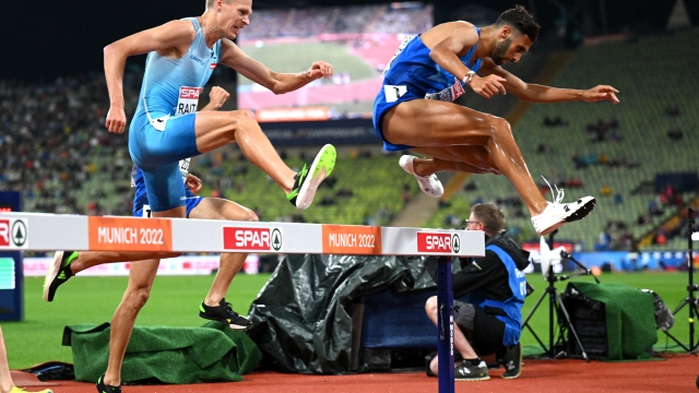 MUNICH, GERMANY - AUGUST 19: Ahmed Abdelwahed of Italy and Topi Raitanen of Finland compete in the Athletics - Men's 3000m Steeplechase Final on day 9 of the European Championships Munich 2022 at Olympiapark on August 19, 2022 in Munich, Germany. (Photo by Matthias Hangst/Getty Images)
