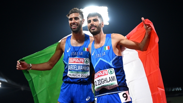 MUNICH, GERMANY - AUGUST 19: Silver medalist Ahmed Abdelwahed of Italy and Bronze medalist Osama Zoghlami of Italy celebrate after the Athletics - Men's 3000m Steeplechase Final on day 9 of the European Championships Munich 2022 at Olympiapark on August 19, 2022 in Munich, Germany. (Photo by Matthias Hangst/Getty Images)