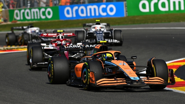 SPA, BELGIUM - AUGUST 28: Lando Norris of Great Britain driving the (4) McLaren MCL36 Mercedes leads Zhou Guanyu of China driving the (24) Alfa Romeo F1 C42 Ferrari during the F1 Grand Prix of Belgium at Circuit de Spa-Francorchamps on August 28, 2022 in Spa, Belgium. (Photo by Dan Mullan/Getty Images)