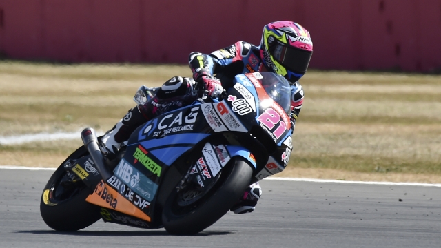 Spain's rider Alonso Lopez of the MB Conveyors Speed Up steers his motorcycle during the Moto2 race at the British Motorcycle Grand Prix at the Silverstone racetrack, in Silverstone, England, Sunday, Aug. 7, 2022. (AP Photo/Rui Vieira)