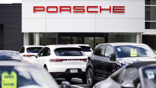 epa10165199 Porsches for sale at one of the brand's dealerships in Tyson's Corner, Virginia, USA, 06 September 2022. The Volkswagen Group, which owns Porsche, announced it will spin off the iconic sports car brand in an IPO this fall.  EPA/JIM LO SCALZO