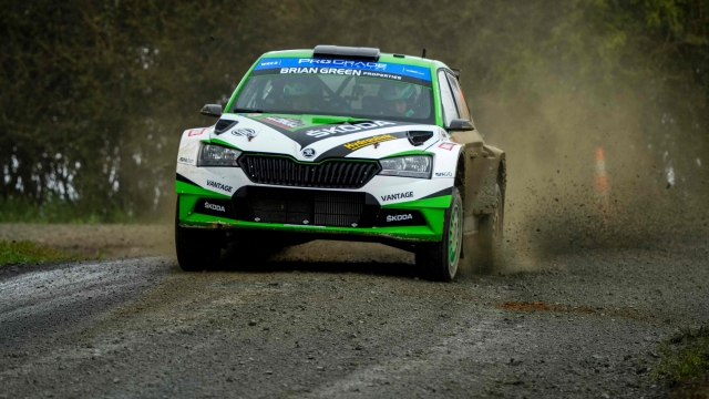 New Zealand's Ben Hunt and co-driver Tony Rawstorn drive their Skoda Fabia Evo in the 4th stage Whaanga Coast during the 2022 Rally New Zealand, the 11th round of the FIA World Rally Championship, in Auckland on September 30, 2022. (Photo by John COWPLAND / AFP)