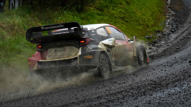 Finland's Kalle Rovanpera and his co-driver Jonne Halttunen drive their Gr Yaris Rally 1 Hybrid during SS12 of the Rally New Zealand, the 11th round of the FIA World Rally Championship, in Puhoi in the outskits of Auckland on October 01, 2022. (Photo by John COWPLAND / AFP)
