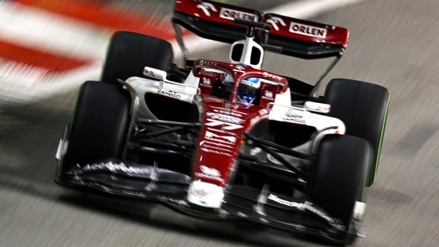 SINGAPORE, SINGAPORE - OCTOBER 02: Valtteri Bottas of Finland driving the (77) Alfa Romeo F1 C42 Ferrari on track during the F1 Grand Prix of Singapore at Marina Bay Street Circuit on October 02, 2022 in Singapore, Singapore. (Photo by Clive Mason/Getty Images,)