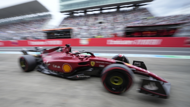 Ferrari driver Charles Leclerc of Monaco powers his car out of the pits during practice session 3 at the Japanese Formula One Grand Prix at the Suzuka Circuit in Suzuka, central Japan, Saturday, Oct. 8, 2022. (AP Photo/Eugene Hoshiko)