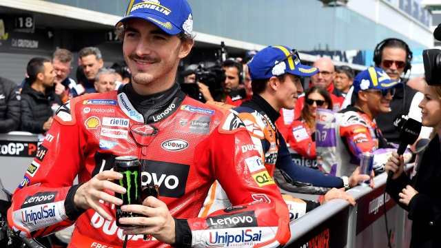 Ducati Lenovo's Italian rider Francesco Bagnaia talks to media after securing third pole position at the end of the qualifying session in Phillip Island on October 15, 2022, ahead of Australian MotoGP Grand Prix. (Photo by Paul CROCK / AFP) / -- IMAGE RESTRICTED TO EDITORIAL USE - STRICTLY NO COMMERCIAL USE --