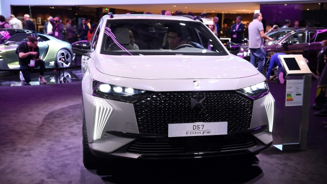 The DS 7 e-tense 4X4 360 is presented on the first day of the Paris auto show on October 17, 2022. (Photo by Eric PIERMONT / AFP)