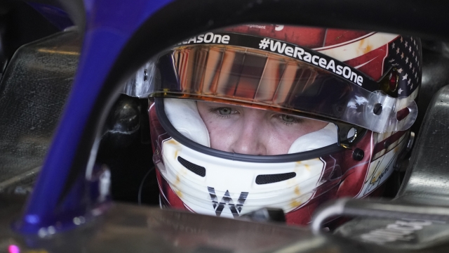 Williams test driver Logan Sargeant sits in his car during the first practice session for the Formula One U.S. Grand Prix auto race at Circuit of the Americas, Friday, Oct. 21, 2022, in Austin, Texas. (AP Photo/Darron Cummings)