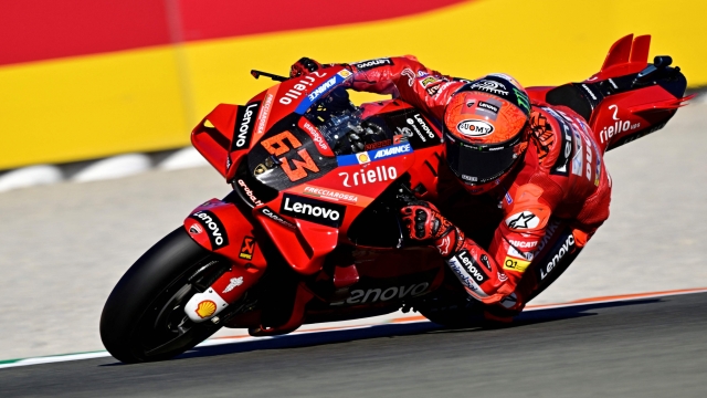 TOPSHOT - Ducati Italian rider Francesco Bagnaia rides during the Valencia MotoGP Grand Prix qualifying session at the Ricardo Tormo racetrack in Cheste, near Valencia, on November 5, 2022. (Photo by JAVIER SORIANO / AFP)