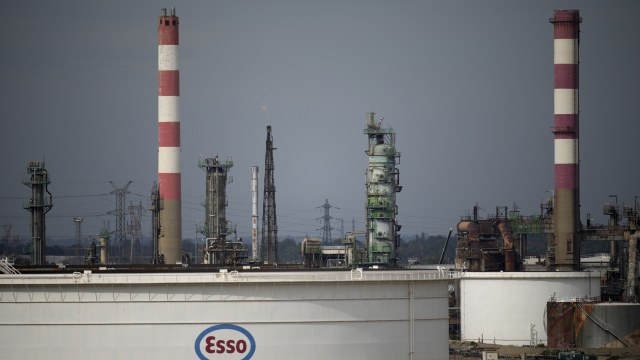 The Esso oil refinery is pictured Thursday, Oct. 13, 2022 in For-sur-Mer, southern France. French President Emmanuel Macron promised the situation in the country's gas stations will soon be back to "normal" as the government started requisitioning some workers at ExxonMobil's Esso gas stations amid an ongoing strike that is making life difficult for French drivers. (AP Photo/Daniel Cole)
