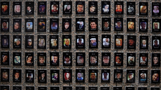 (FILES) In this file photo taken on September 26, 2022 photos of fentanyl victims are on display at The Faces of Fentanyl Memorial at the US Drug Enforcement Administration headquarters on September 27, 2022 in Arlington, Virginia. - Drug overdoses among people aged 10 to 18 more than doubled in the United States between 2019 and 2021, according to a study released December 15, 2022 by health authorities, who warned in particular of the risks of counterfeit pills containing fentanyl. (Photo by ALEX WONG / GETTY IMAGES NORTH AMERICA / AFP)