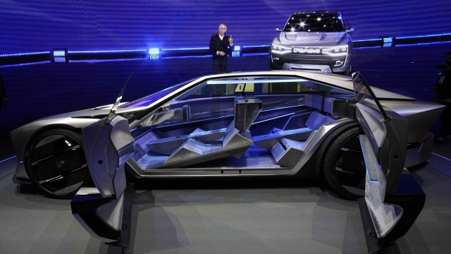 The Peugeot Inception Concept car is on display at the Stellantis booth during the CES tech show Friday, Jan. 6, 2023, in Las Vegas. (AP Photo/John Locher)