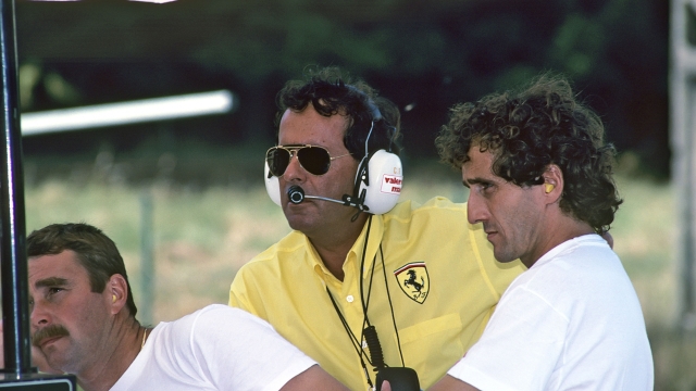 Nigel Mansell, Cesare Fiorio, Alain Prost, Grand Prix of France, Circuit Paul Ricard, July 8, 1990. Ferrari drivers Nigel Mansell and Alain Prost, with Ferrari team manager Cesare Fiorio. (Photo by Paul-Henri Cahier/Getty Images)