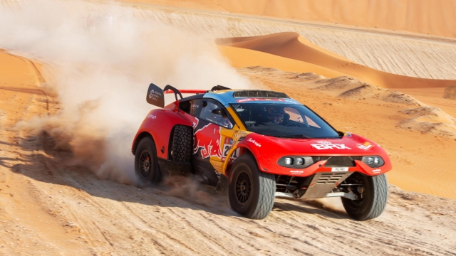 epa10401060 French driver Sebastien Loeb and Belgain co-driver Fabian Lurquin of Bahrain Raid Xtreme team in action during the 11th stage of the Dakar Rally 2023 from Shaybah to Empty Quarter, Saudi Arabia, 12 January 2023.  EPA/Gerard Laurenssen