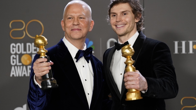Ryan Murphy, left, winner of the Carol Burnett award, and Evan Peters, winner of the award for best performance by an actor in a limited series, anthology series, or a motion picture made for television for "Dahmer - Monster: The Jeffrey Dahmer Story," pose in the press room at the 80th annual Golden Globe Awards at the Beverly Hilton Hotel on Tuesday, Jan. 10, 2023, in Beverly Hills, Calif. (Photo by Chris Pizzello/Invision/AP)