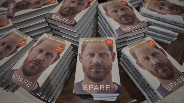 Copies of the new book by Prince Harry called "Spare" are displayed at a book store in London, Tuesday, Jan. 10, 2023. Prince Harry's memoir "Spare" went on sale in bookstores on Tuesday, providing a varied portrait of the Duke of Sussex and the royal family. (AP Photo/Kin Cheung)