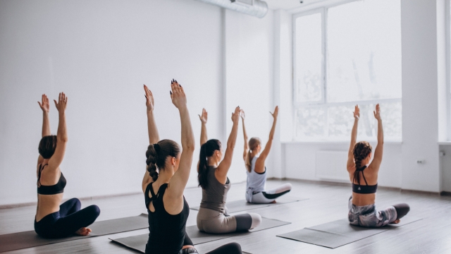 Yoga group classes inside the gym