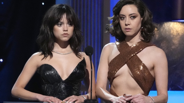 Jenna Ortega, left, and Aubrey Plaza present the award for outstanding performance by a male actor in a television movie or limited series at the 29th annual Screen Actors Guild Awards on Sunday, Feb. 26, 2023, at the Fairmont Century Plaza in Los Angeles. (AP Photo/Chris Pizzello)