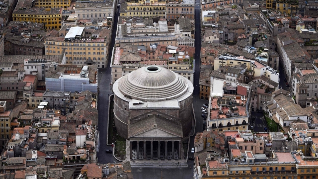 (FILES) This aerial file photo taken on May 1, 2020 shows the Pantheon monument in Rome. - The access to the Pantheon, one of the oldest ancient Roman monuments in the city, has been free so far, but a new agreement between the Culture Ministry, the city of Rome and the administration of the monument, lade public on March 16, 2023, has decided for the introduction of an entrance fee for visitors that should not exceed 5 euros, which will be introduced as soon as the technical steps necessary to allow visitors to purchase the tickets are completed. (Photo by Filippo MONTEFORTE / AFP)