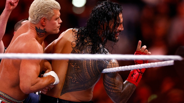 INGLEWOOD, CALIFORNIA - APRIL 02: (L-R) Cody Rhodes wrestles Roman Reigns for Undisputed WWE Universal Title Match during WrestleMania Goes Hollywood at SoFi Stadium on April 02, 2023 in Inglewood, California.   Ronald Martinez/Getty Images/AFP (Photo by RONALD MARTINEZ / GETTY IMAGES NORTH AMERICA / Getty Images via AFP)