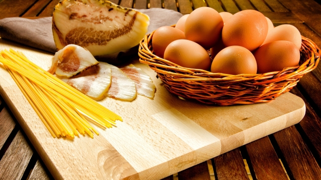 16780603 - spaghetti carbonara ingredients, bacon, eggs, pasta