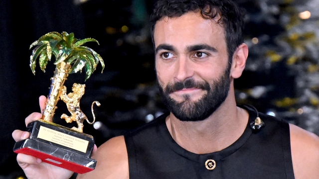 Italian singers Marco Mengoni poses with the prize after winning the the 73rd Sanremo Italian Song Festival, in Sanremo, Italy, 11 February 2023. The music festival will run from 07 to 11 February 2023.  ANSA/ETTORE FERRARI