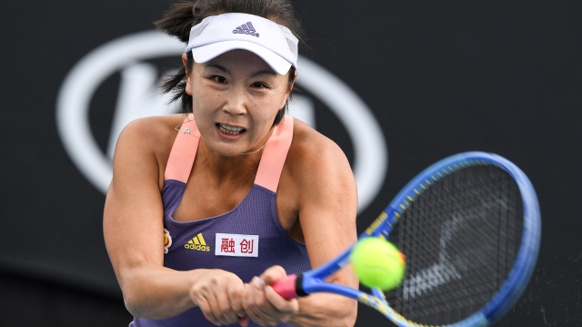 (FILES) China's Peng Shuai hits a return against Japan's Nao Hibino during their women's singles match on day two of the Australian Open tennis tournament in Melbourne on January 21, 2020. - Professional women's tennis tournaments will resume in China in September after a 16-month boycott over concerns for the safety of Chinese player Peng Shuai, the WTA announced on April, 13, 2023. The former doubles world number one has not been seen outside China since first making, and then withdrawing, accusations of sexual assault against a high-ranking official. (Photo by Greg WOOD / AFP) / IMAGE RESTRICTED TO EDITORIAL USE - STRICTLY NO COMMERCIAL USE