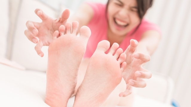 woman with athlete foot in the room