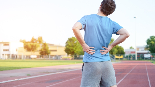 Sportsman feeling backache because of herniated disc