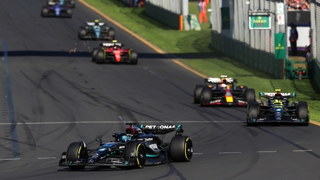 MELBOURNE, AUSTRALIA - APRIL 02: George Russell of Great Britain driving the (63) Mercedes AMG Petronas F1 Team W14 leads a line of cars during the F1 Grand Prix of Australia at Albert Park Grand Prix Circuit on April 02, 2023 in Melbourne, Australia. (Photo by Peter Fox/Getty Images)