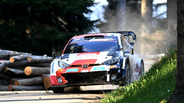 Finnish driver Kalle Rovanpera and Finnish co-driver Jonne Halttunen compete in their Toyota GR Yaris Rally1 Hybrid car during the Super stage 15 between Ravna and Gora-Skrad of Croatia Rally 2023, part of the FIA World Rally Championship, in Skrad, Croatia, on April 22, 2023. (Photo by Denis LOVROVIC / AFP)