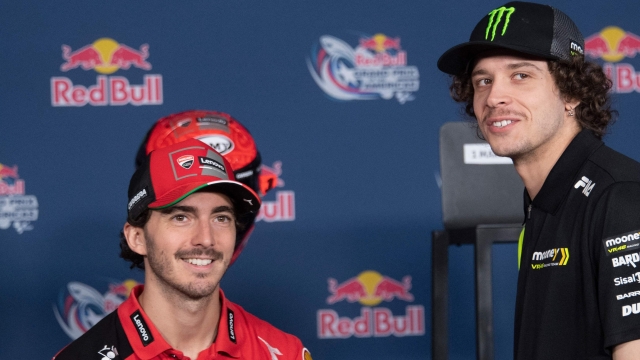 AUSTIN, TEXAS - APRIL 13: Francesco Bagnaia of Italy and Ducati Lenovo Team (LK) speaks with Marco Bezzecchi of Italy and Mooney VR46 Racing Teamduring the press conference pre-event during the MotoGP Of The Americas - Previews on April 13, 2023 in Austin, Texas.   Mirco Lazzari gp/Getty Images/AFP (Photo by Mirco Lazzari gp / GETTY IMAGES NORTH AMERICA / Getty Images via AFP)