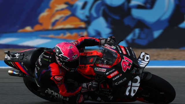 Aprilia Spanish rider Aleix Espargaro takes a curve during the first practice session of the MotoGP Spanish Grand Prix at the Jerez racetrack in Jerez de la Frontera on April 28, 2023. (Photo by PIERRE-PHILIPPE MARCOU / AFP)