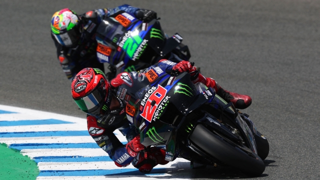 Yamaha French rider Fabio Quartararo (Front) rides ahead of Yamaha Italian rider Franco Morbidelli rides during the second practice session of the MotoGP Spanish Grand Prix at the Jerez racetrack in Jerez de la Frontera on April 28, 2023. (Photo by PIERRE-PHILIPPE MARCOU / AFP)