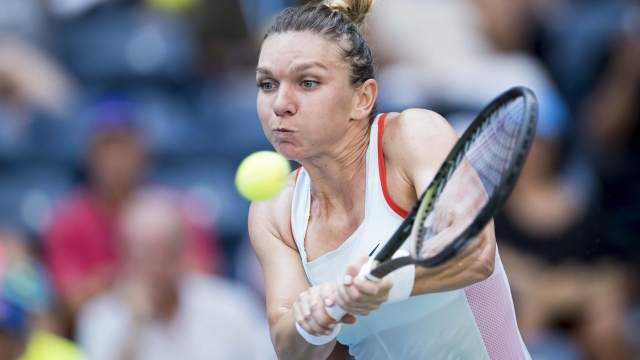 epa10257179 (FILE) - Simona Halep of Romania hits a return to Daria Snigur of Ukraine during their first round match at the US Open Tennis Championships at the USTA National Tennis Center in the Flushing Meadows, New York, USA, 29 August 2022 (reissued 21 October 2022). The International Tennis Integrity Agency on 21 October 2022 in a statement announced that Halep has been provisionally suspended for violating an anti-doping rule. The B sample taken during the 2022 US Open confirmed the finding of anti-anaemia drug Roxadustat in the A sample. Halep denies knowingly taken a prohibited substance.  EPA/JUSTIN LANE *** Local Caption *** 57888350
