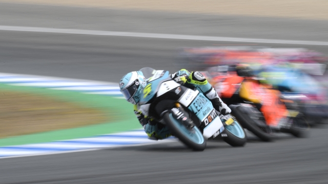 Riders compete during the Moto3 race of the Spanish Grand Prix at the Jerez Circuit in Jerez de la Frontera on April 30, 2023. (Photo by JORGE GUERRERO / AFP)