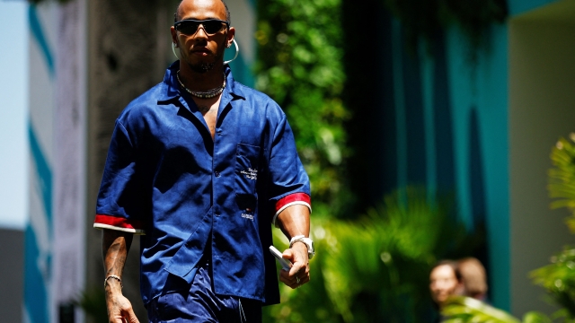 MIAMI, FLORIDA - MAY 04: Lewis Hamilton of Great Britain and Mercedes walks in the Paddock during previews ahead of the F1 Grand Prix of Miami at Miami International Autodrome on May 04, 2023 in Miami, Florida.   Jared C. Tilton/Getty Images/AFP (Photo by Jared C. Tilton / GETTY IMAGES NORTH AMERICA / Getty Images via AFP)
