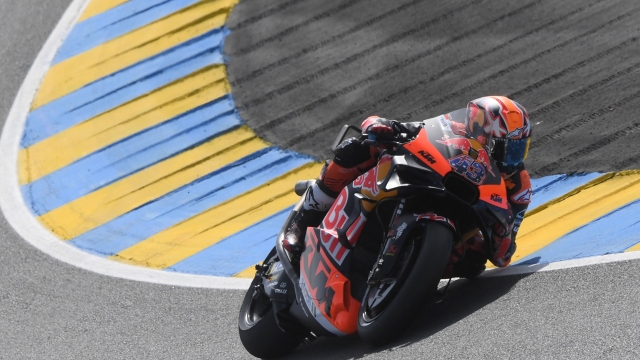 Red Bull KTM  Factory Racing Australian's rider Jack Miller competes during the 1st free practice session ahead of the French MotoGP Grand Prix race of the French motorcycling Grand Prix, in Le Mans, northwestern France, on May 12, 2023. (Photo by JEAN-FRANCOIS MONIER / AFP)