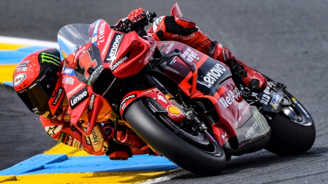 Ducati Lenovo Team's Italian rider Pecco  Bagnaia rides  during the 2nd free practice session ahead of the French MotoGP Grand Prix race of the French motorcycling Grand Prix, in Le Mans, northwestern France, on May 12, 2023. (Photo by JEAN-FRANCOIS MONIER / AFP)