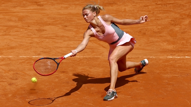 ROME, ITALY - MAY 14: Camila Giorgi of Italy plays a forehand shot against Karolina Muchova of the Czech Republic during the Women's Singles Third Round match during Day Seven of the Internazionali BNL D'Italia 2023 at Foro Italico on May 14, 2023 in Rome, Italy. (Photo by Alex Pantling/Getty Images)