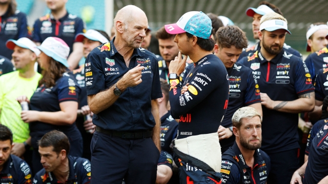MIAMI, FLORIDA - MAY 07: Adrian Newey, the Chief Technical Officer of Red Bull Racing talks with Sergio Perez of Mexico and Oracle Red Bull Racing in the Paddock after the F1 Grand Prix of Miami at Miami International Autodrome on May 07, 2023 in Miami, Florida.   Chris Graythen/Getty Images/AFP (Photo by Chris Graythen / GETTY IMAGES NORTH AMERICA / Getty Images via AFP)